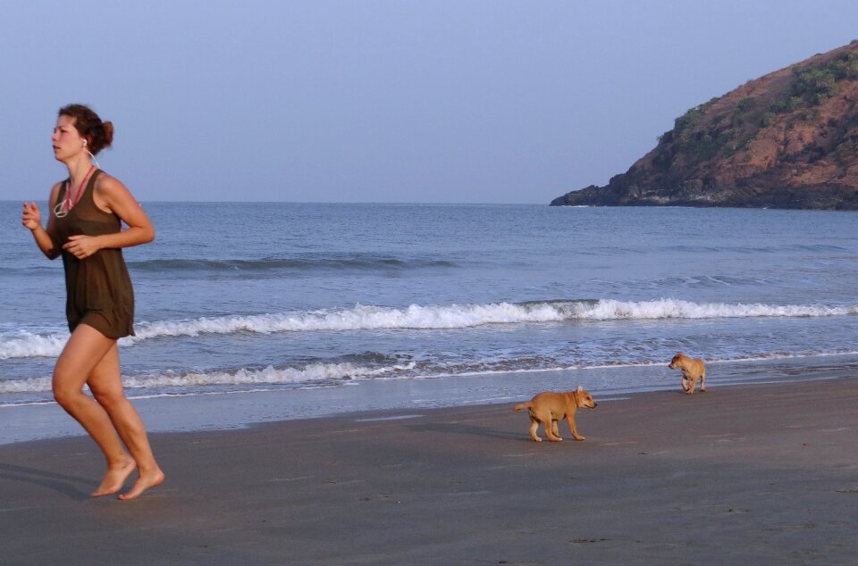 Sand playing woman