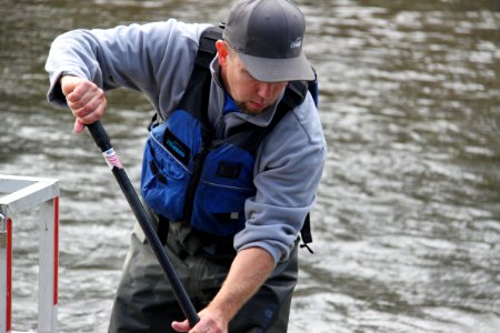Scooping out a fish trap