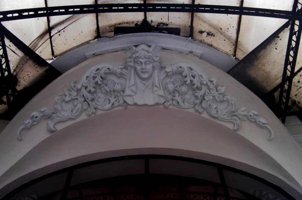 grotesque on door lintel