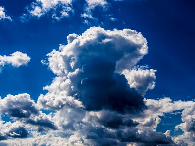 Blue fluffy cloudscape photo