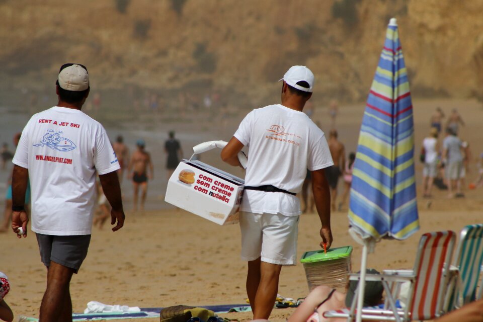 Beach sale people working