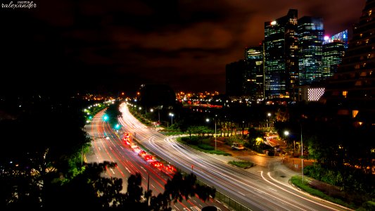 Long shot of traffic next to Marina bay