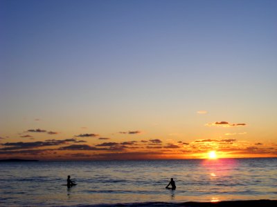 Surfers at Constantine, Cornwall photo