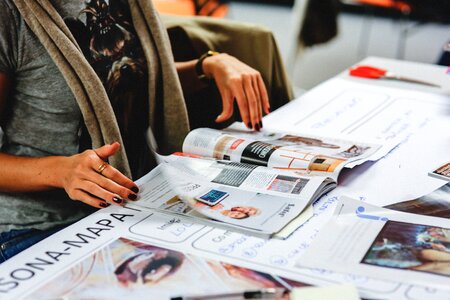 Newspaper magazine hands