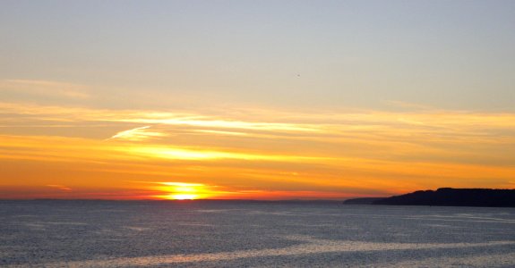 Sunset over Lyme Bay photo