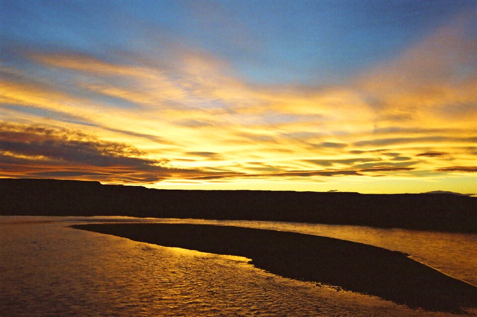 Island mountains orange sky