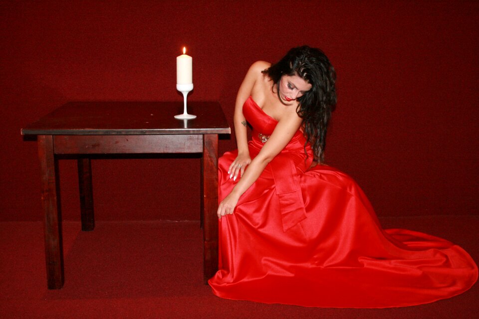 Lady in red table candle