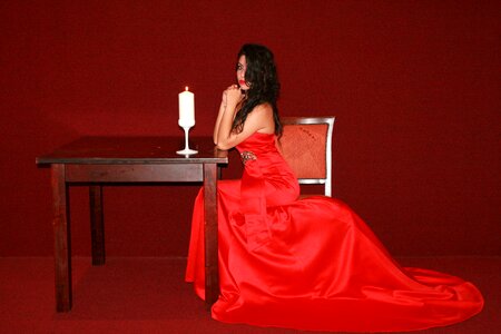 Lady in red table candle