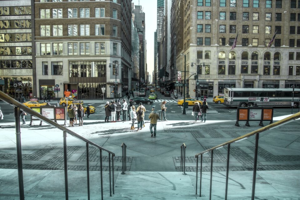 Pedestrians walking sidewalk photo