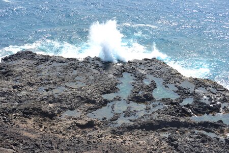 Waves spray surf