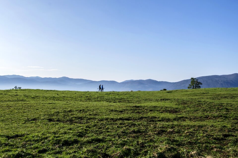 Persons hiking horizon