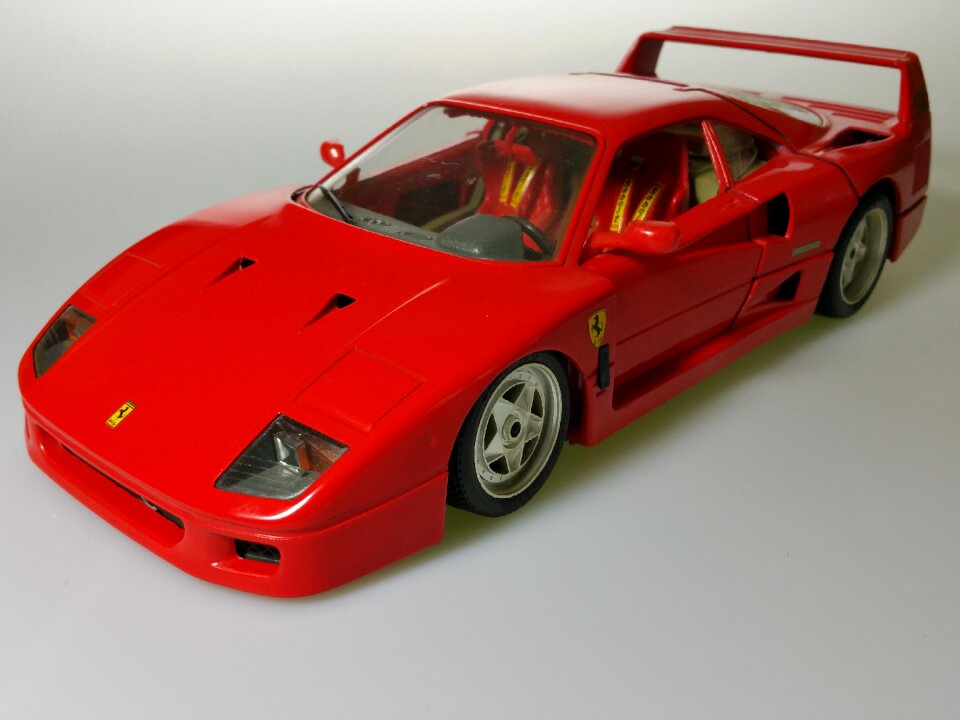 Red vehicle model car