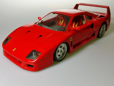 Red vehicle model car