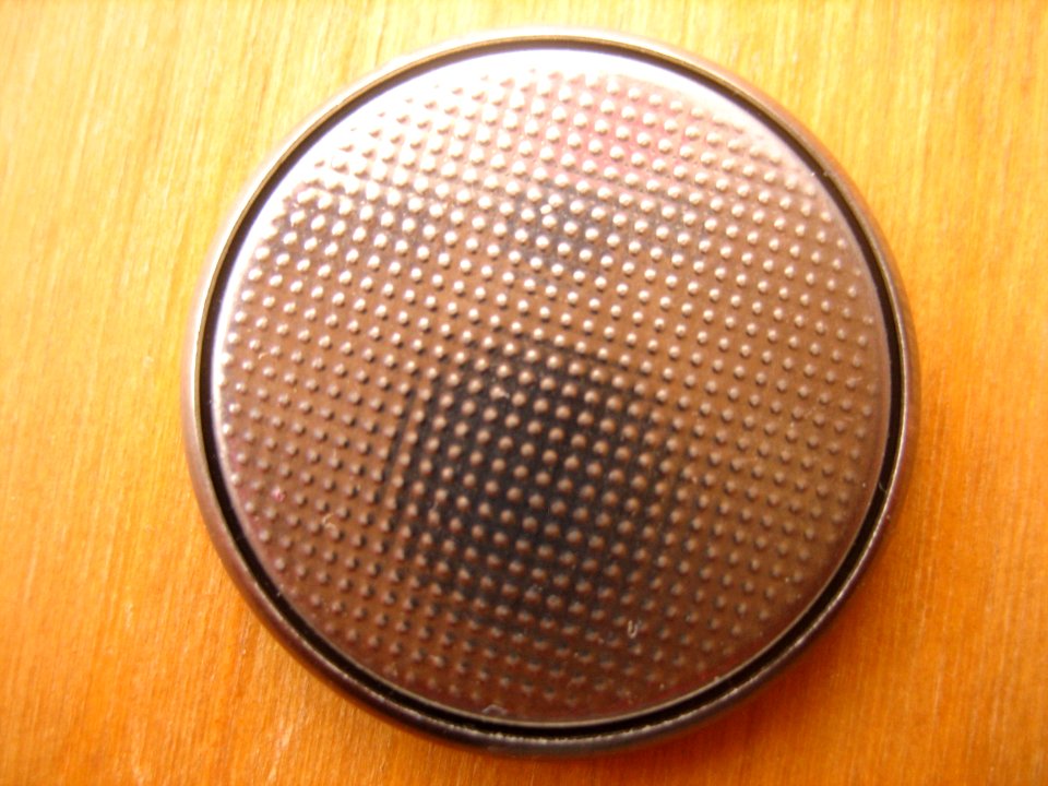 Button Cell Battery Cam Reflection
