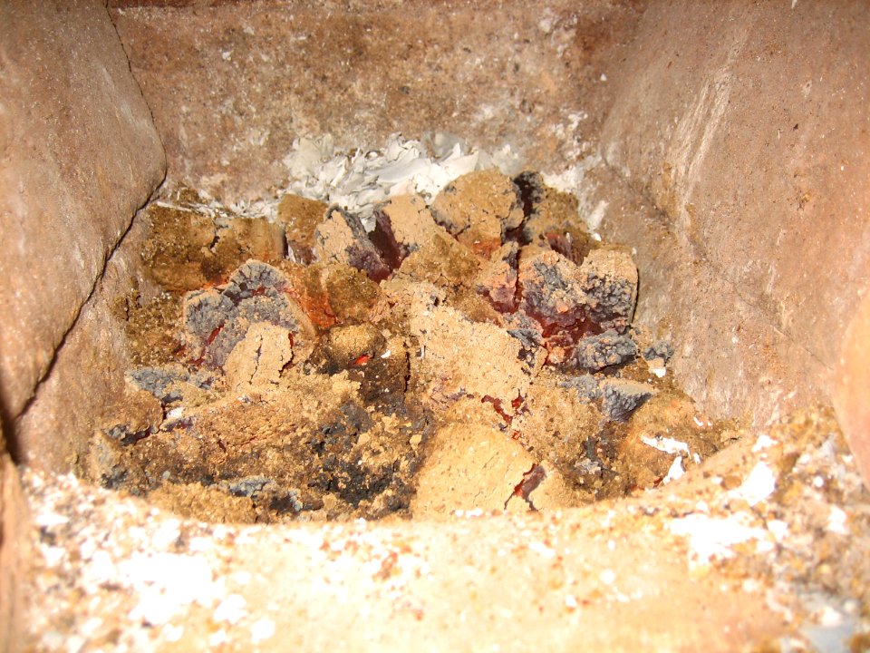 Glowing Hot Coal in a Tile Oven Public Domain photo (flash)