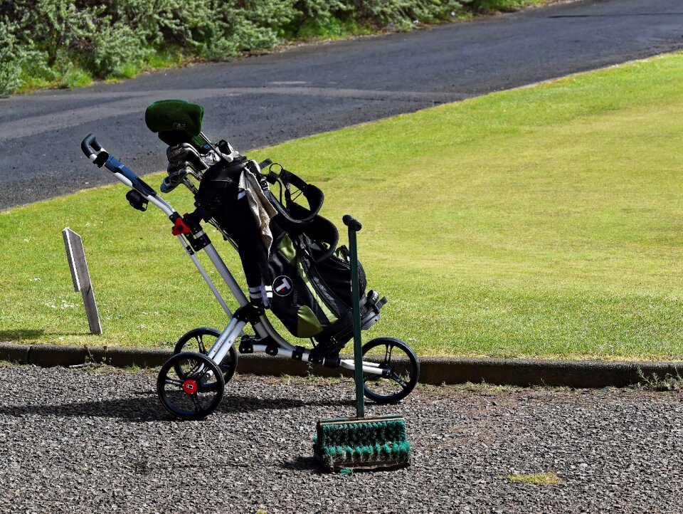 Golf clubs golf bag trolley photo