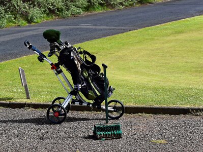 Golf clubs golf bag trolley photo