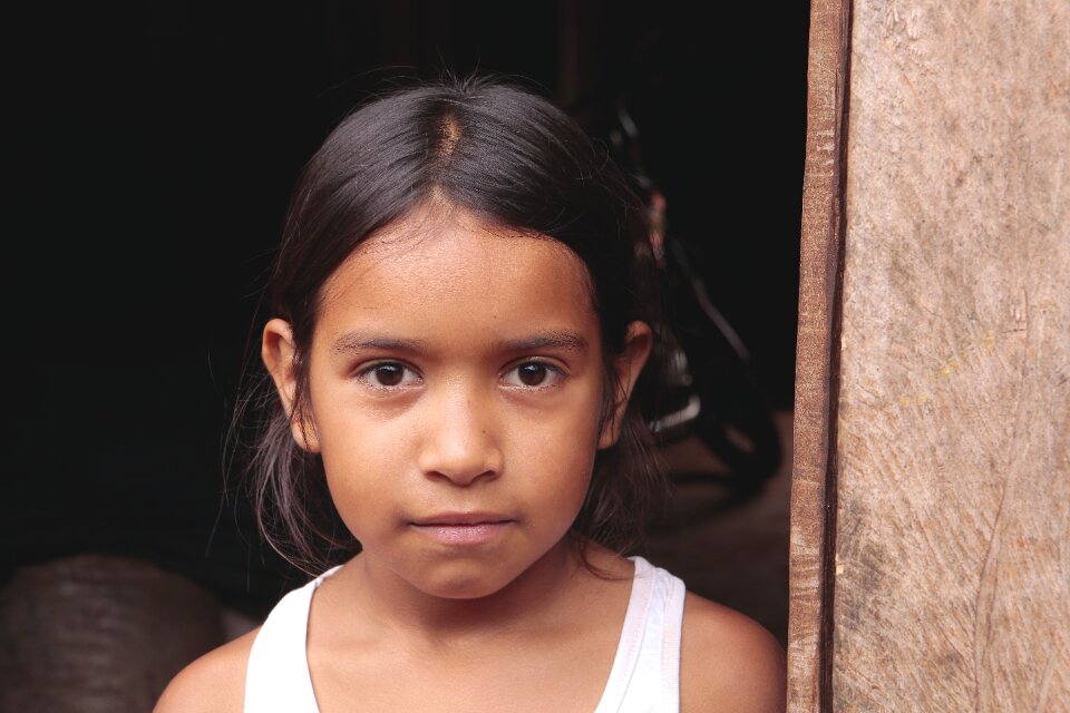 Portrait dark background little girl