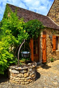 Stone well door shutters