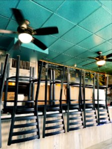 Chairs on bar and ceiling fan at Primanti Bros.