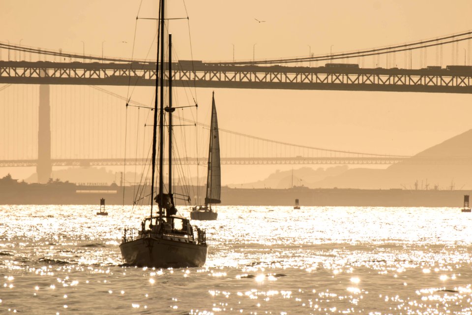 Yacht Sailing the Bay in the Evening