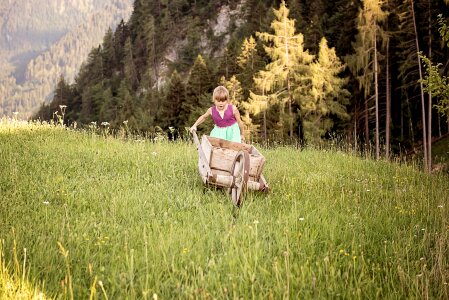 Girl wheelbarrow wooden wheelbarrow