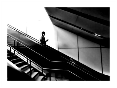 Using the escalator - the light photo