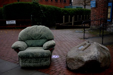 A soft chair and a hard rock