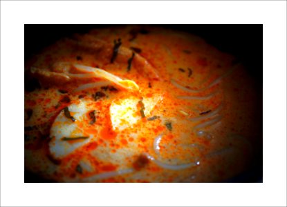 Creamy spicy gravy of laksa photo