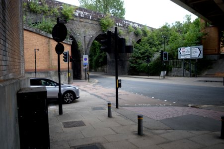 Coulsdon railway bridge seen through the new bridge carrying the relief road