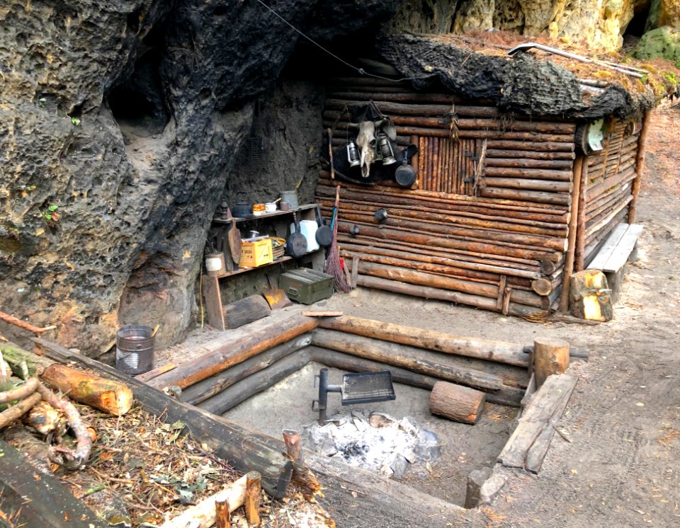 Camp in the rocks. No homeless den - regular folks visit this place for a weekend and it's free to use for anyone.