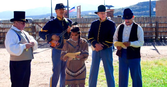 Living History: Soldiers, a Civilian, a Blacksmith, and an American Indian Girl Singing