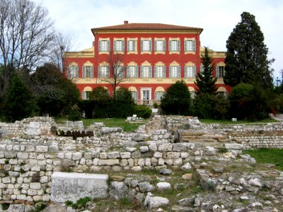 mansion with ruins garden photo