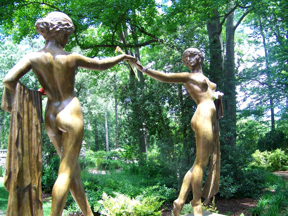 dest statues with flowers