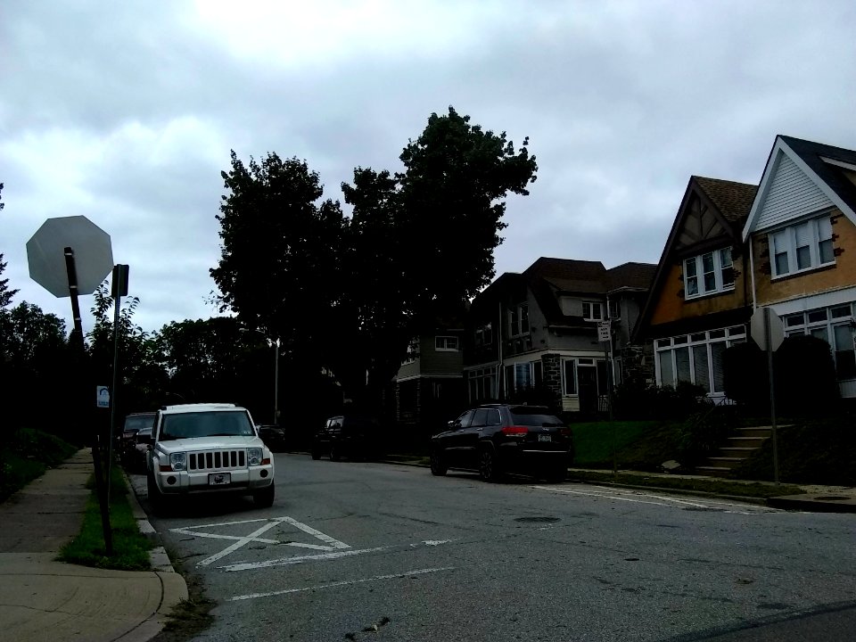 a street with houses probably as old as the street itself