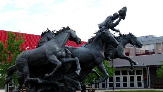 Horses and Cowboy statue photo