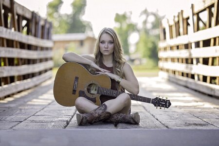Acoustic guitar talent woman