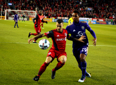 Giovinco holds off Tommy Redding photo