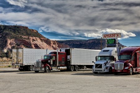 Semi Truck and Trailers at a Gas Station Entering the Mountains of New Mexico