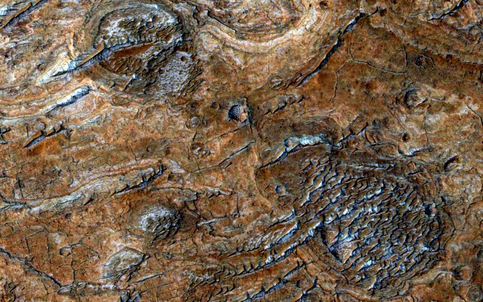Mars - Light-toned layering along plains southwest of Melas Chasma