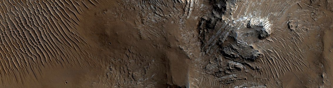 Mars - Intact Layered Rocks Uplifted in Unnamed Crater Off of Solis Dorsa