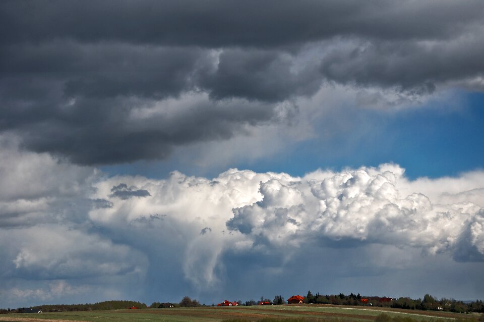 Village dark clouds sky
