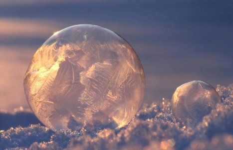Frozen soap bubbles in Christmas sun photo