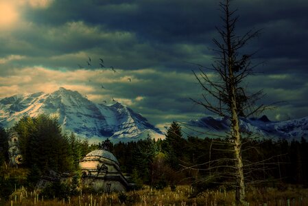 Buildings mountains sky photo