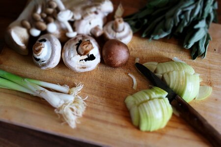 Knife mushrooms onions photo
