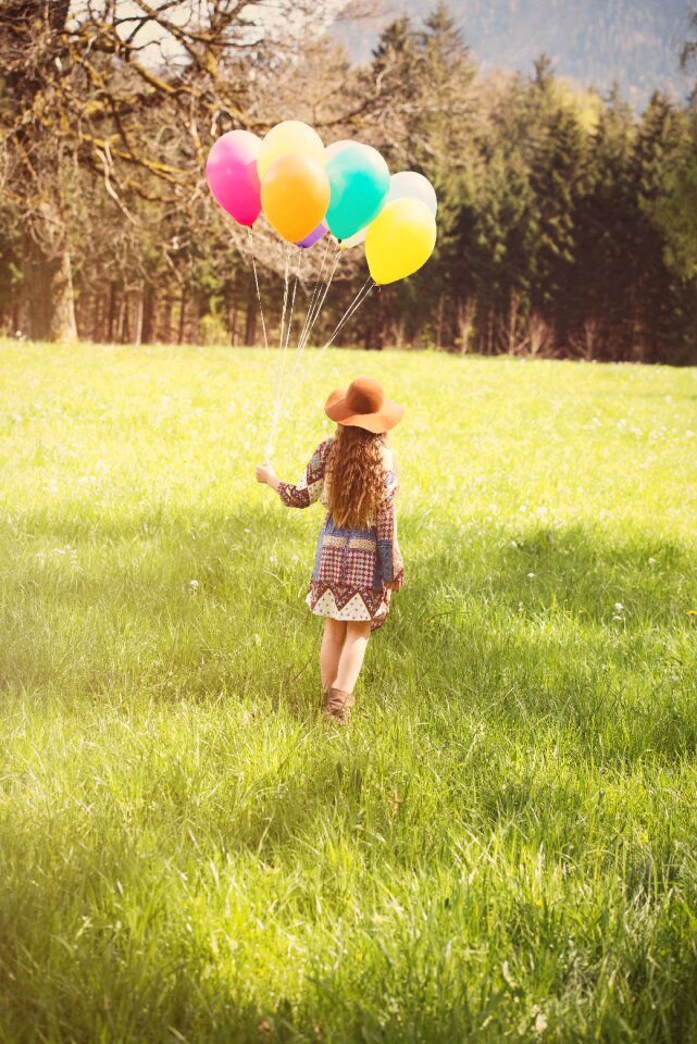 Girl balloons colorful