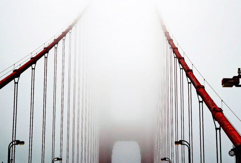 Misty steel suspension bridge
