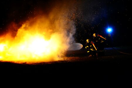Fireman burns the flames photo