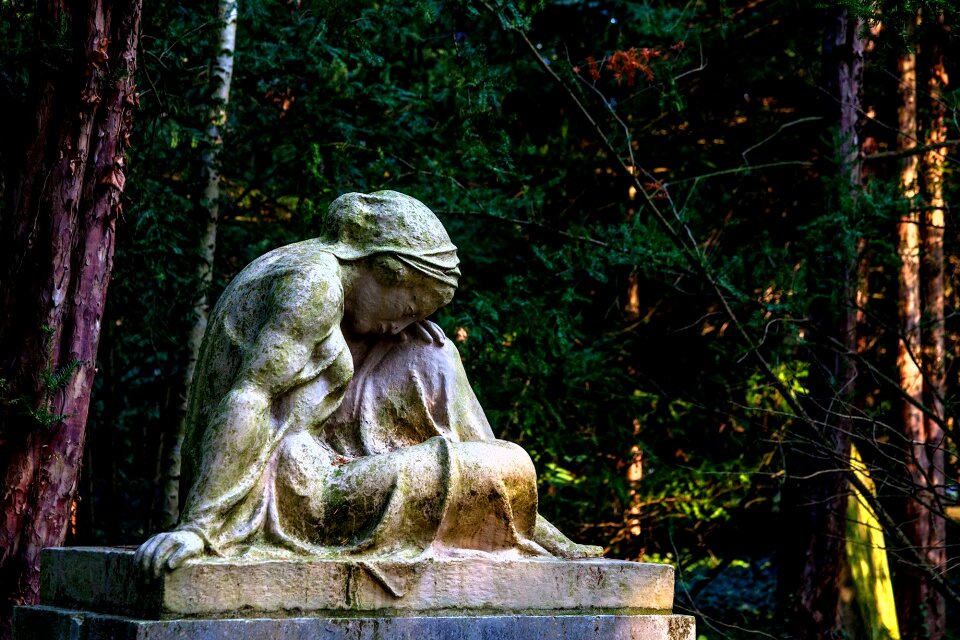 Faith statue tombstone