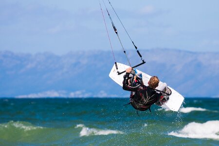 Kite-surfing male action photo